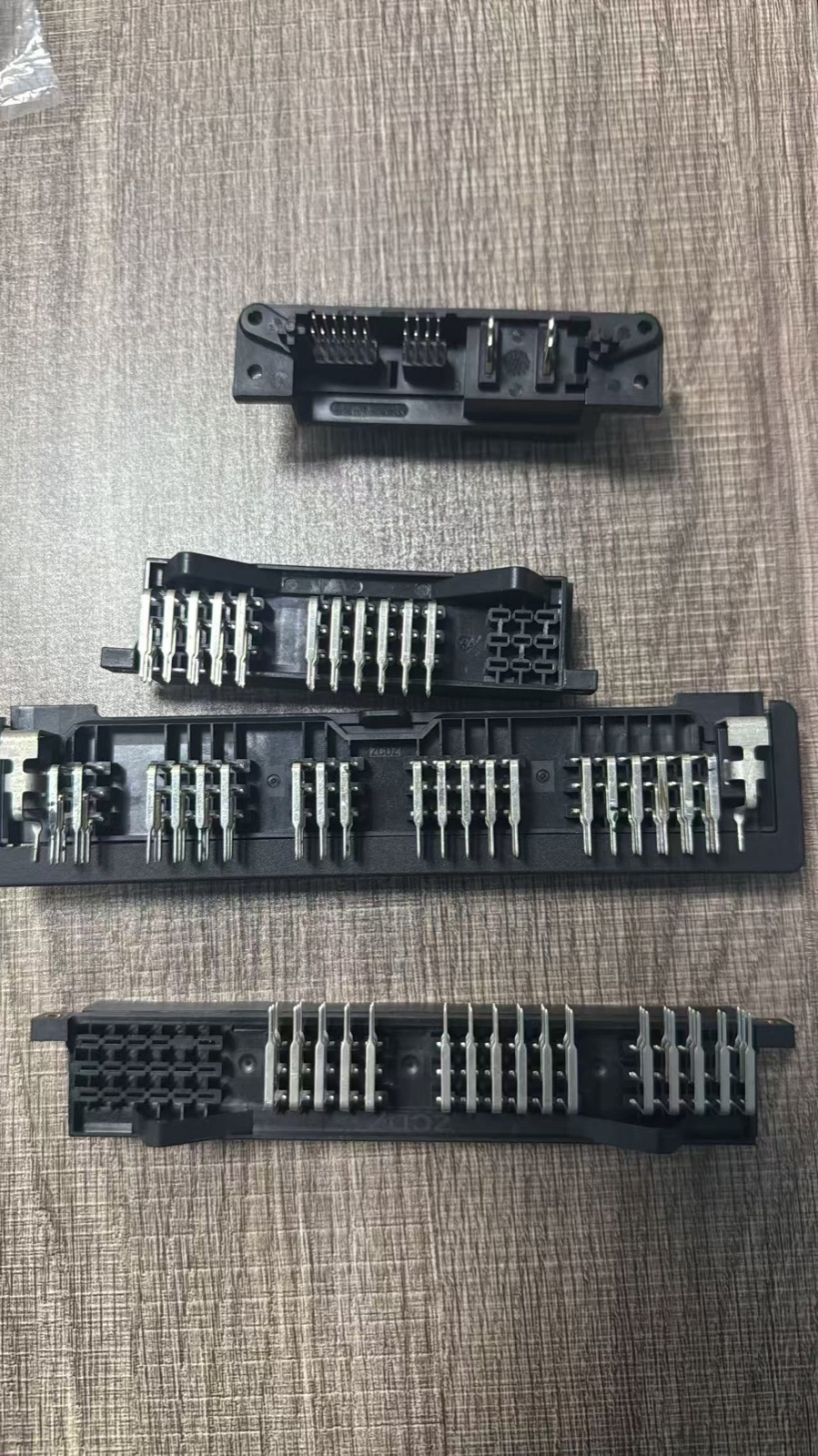 Representative black molded housings with metal terminals