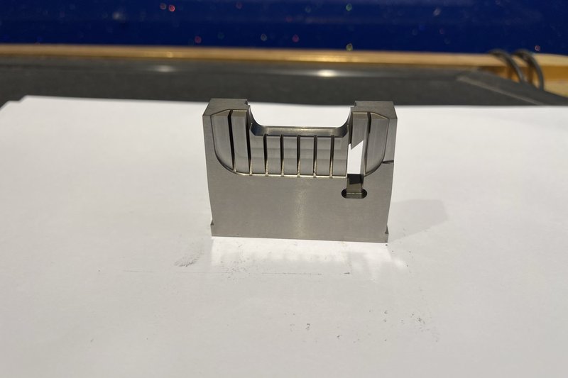 Precision steel mold insert for connector tooling with machined profile features