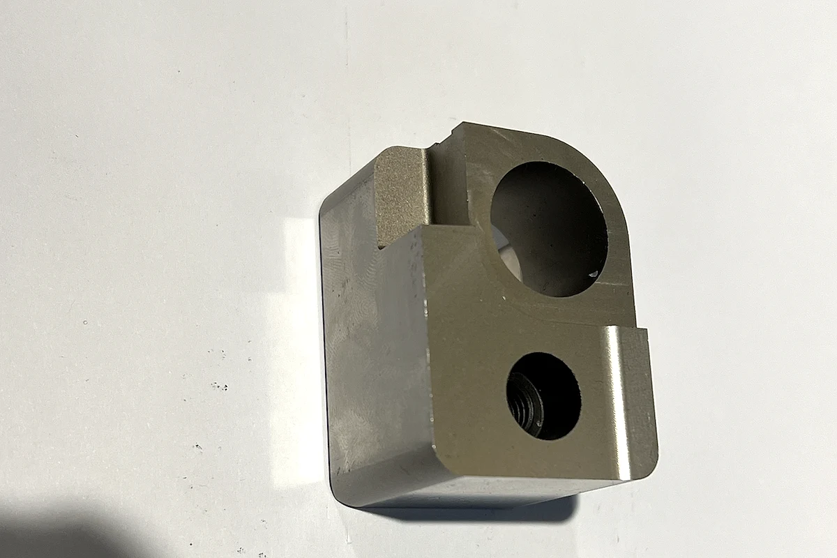 Real Huicheng machined motion block with bores, shoulders and controlled fit surfaces