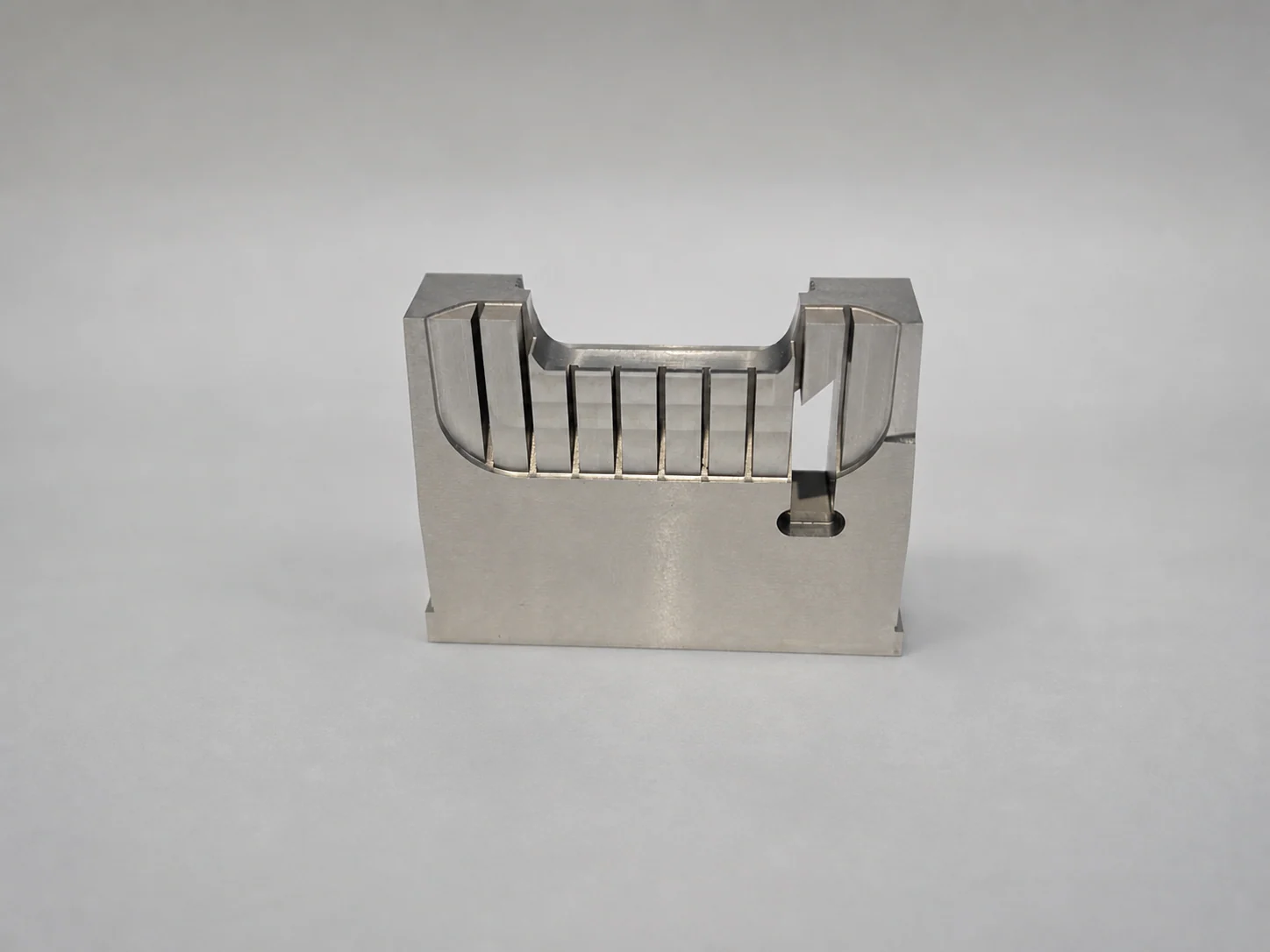 Precision hardened steel mold insert based on Huicheng company photography, professionally retouched