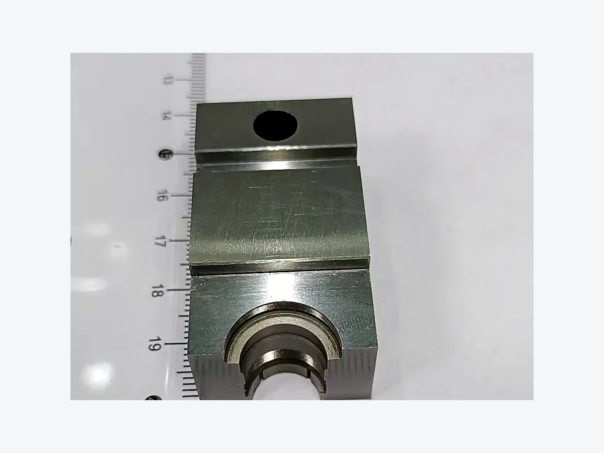 Huicheng-supplied photograph of a machined precision component with split lines and fitted interfaces