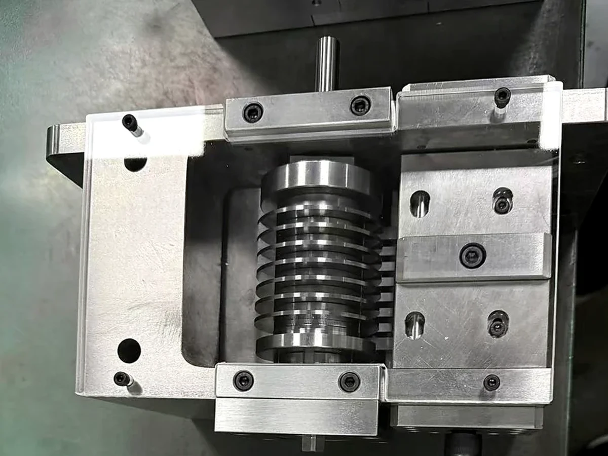 Huicheng-supplied photograph of an open mold assembly with fitted components and fastening interfaces